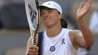 Swiatek overcomes nervous start to breeze into second round at French Open
