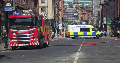 Fire crews tackle blaze at historic Glasgow building as smoke plumes above city