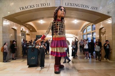 Little Amal, a 12-foot puppet of a Syrian refugee, will travel the US