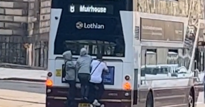 Reckless Edinburgh youths filmed 'bus surfing' down busy city centre road