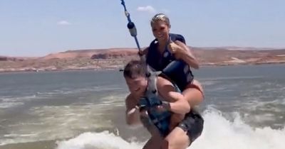 Zach Wilson water skis with model girlfriend on his shoulders after Aaron Rodgers setback