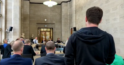 Moment Manchester council was forced to suspend town hall meeting due to protesters