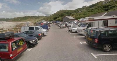 Cornwall beach car park branded 'scam' after visitor fined despite buying ticket