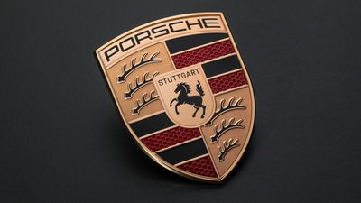 New Porsche crest hones the lines and forms of the famous German automotive brandmark