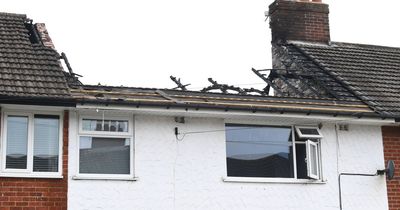House bursts into flames before roof collapses
