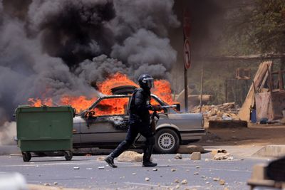 Crowds clash with riot police as Senegal's Sonko sentenced to jail