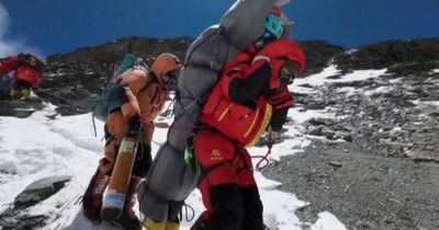 Shivering climber rescued from Mount Everest's 'death zone' in 'impossible' mission