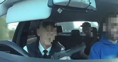 Investigation launched after video appears to show taxi driver holding passenger at gunpoint