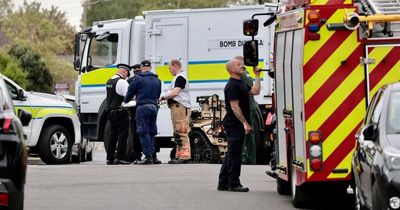 Houses evacuated as bomb disposal units swarm residential street and man is arrested