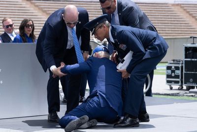 Biden trips and falls on stage at Air Force graduation; White House says he's 'fine'