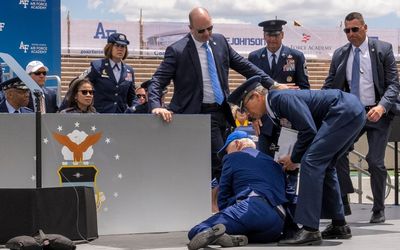 Biden trips and falls during US graduation ceremony