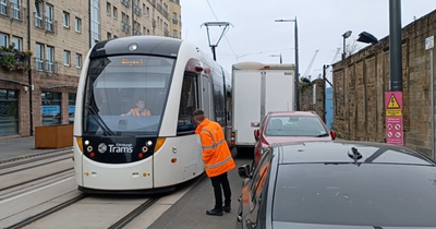 Edinburgh test tram on new track stuck for 'over 20 minutes' behind parked van