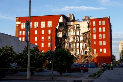 Iowa building collapse - latest: Davenport authorities quit rubble search for missing despite family pleas