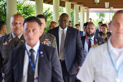 U.S., China defense chiefs shake hands at security summit, but no 'substantive exchange'
