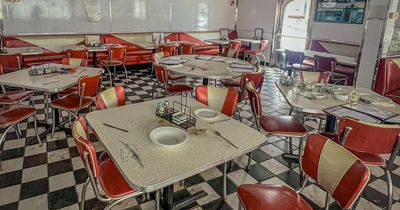 Inside abandoned McDonald's with retro booths and milkshake glasses left behind