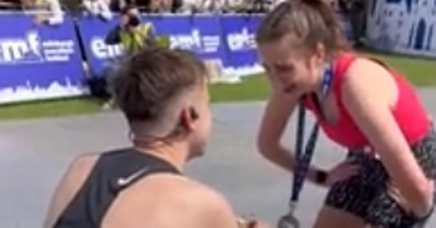 Emotional moment Edinburgh Marathon runner proposes to partner as pair reach finishing line