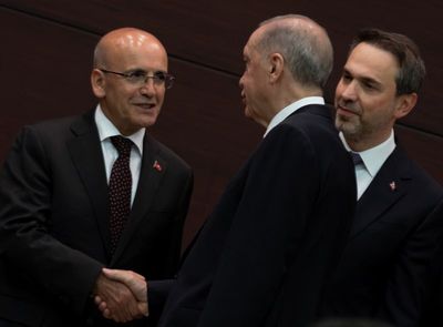 Turkey's Erdogan signals economic U-turn in picking orthodox Simsek