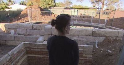 Woman's battle with landlord who built metal 'war bunker' fence to block drive