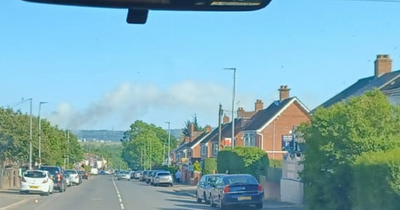 Firefighters tackling blaze at site of planned development in Belfast