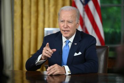 Biden signs debt ceiling bill into law, averting default