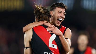 Essendon moves into AFL top six with thrilling win over North Melbourne, Richmond edges GWS