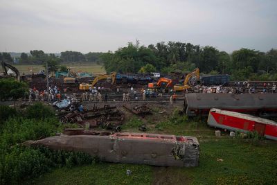 Indian officials end rescue work for 2 wrecked passenger trains that killed over 300 people