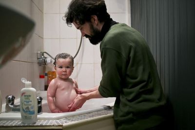 Snapper puts the smiles and selfies aside to capture life as a father
