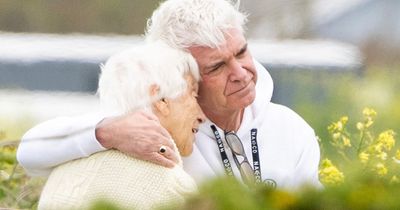 Devastated Phillip Schofield pictured comforting mum, 87, as he reveals This Morning axe
