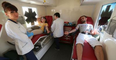 Ukrainians donate their blood for soldiers as lack of weapons delays counter-attack