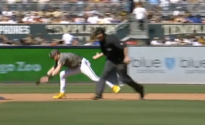 The Padres’ Jake Cronenworth couldn’t believe it after umpire Ryan Wills blocked him from second base