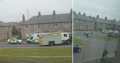 Man dies in 'stabbing' in Scots street as teenager rushed to hospital