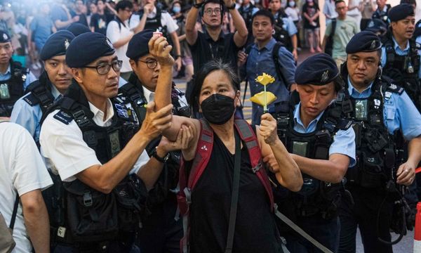Torches and T-shirts: Hongkongers defy attempts to forget Tiananmen