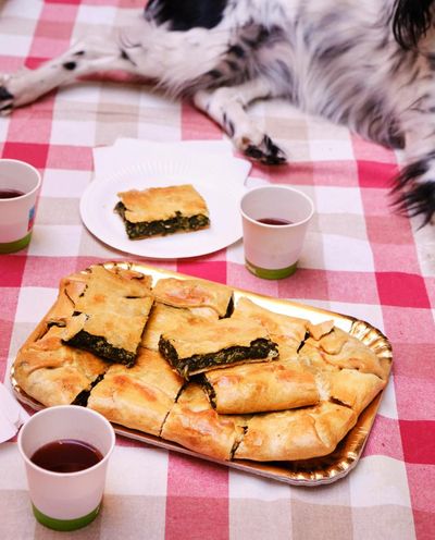 Rachel Roddy’s recipe for picnic pie with greens and parmesan