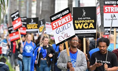 Directors union reaches tentative deal with Hollywood studios as writers strike