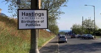 Famous town's cheeky sign highlights the dire state of the UK's pothole roads