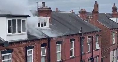 Moment fire rips through roof of Leeds home as police find cannabis farm inside