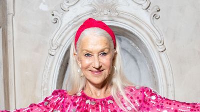 Helen Mirren radiates glamour in sheer sequin-embellished dress and knotted hot pink headband