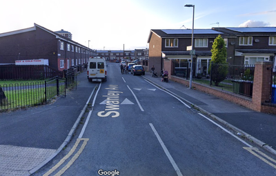 Woman arrested after dog attack leaves boy, 11, seriously injured