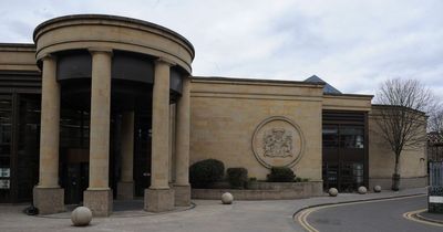 Man turned up to stab his neighbour outside his Lanarkshire home wearing surgical gloves