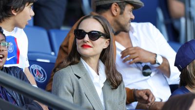 Natalie Portman nails smart-casual dressing with chic oversize blazer, bold red lipstick and classic jeans as she rises above the rumors in Paris