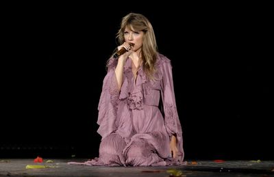 Taylor Swift accidentally swallows a bug during her Eras tour concert in Chicago