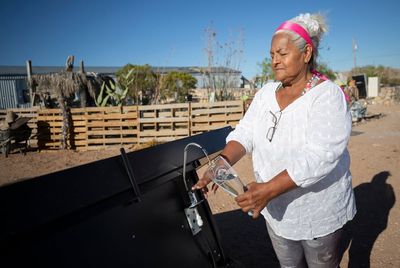 Without access to water lines, Texas colonias residents are pulling water from the desert air