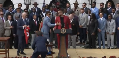 Patrick Mahomes hilariously stopped Travis Kelce from taking the mic during the Chiefs’ White House visit