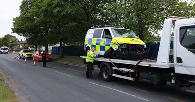 Road closed as police van crashes on way to incident