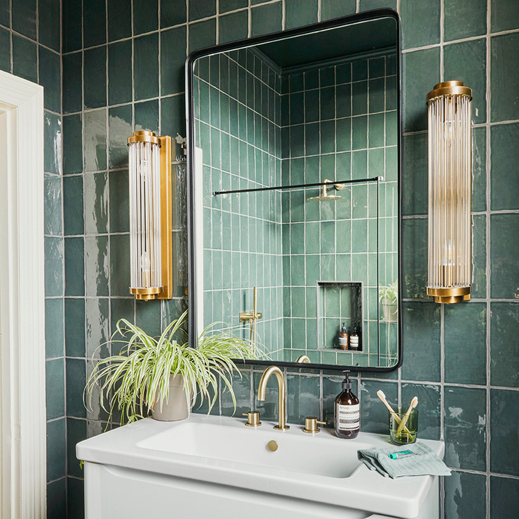 Green tile bathrooms are trending - how to embrace the style in your own home