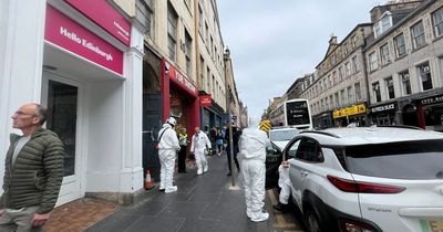 Investigators spotted outside Edinburgh flat days after huge fire closed South Bridge