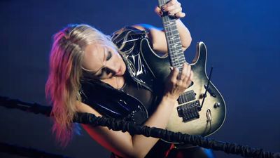 Nita Strauss steps in the ring and delivers a knockout guitar solo in heavyweight new single Victorious