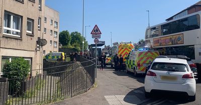 Edinburgh police race to block of flats beside school as ongoing incident unfolds