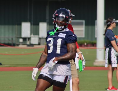 WATCH: Texans QB C.J. Stroud works with RB Dameon Pierce