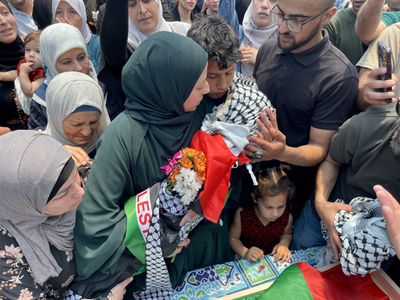 Hundreds of Palestinians bury toddler killed by Israeli forces